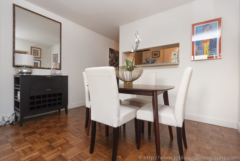 Real estate photographer work, dining room of a one bedroom duplex in midtown New York