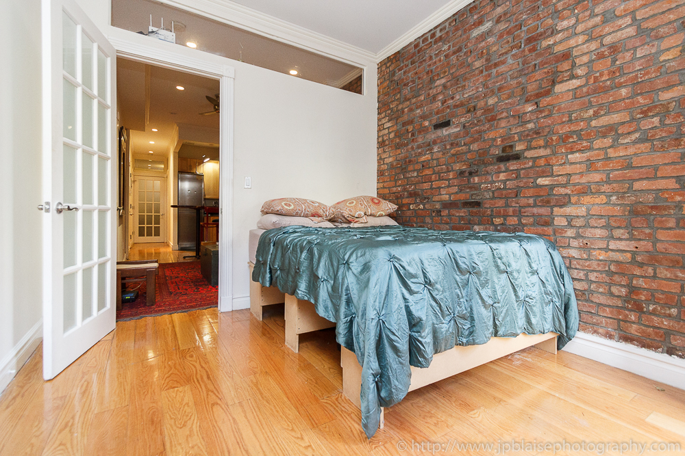 Interior photographer took bedroom pictures of east village apartment in nyc