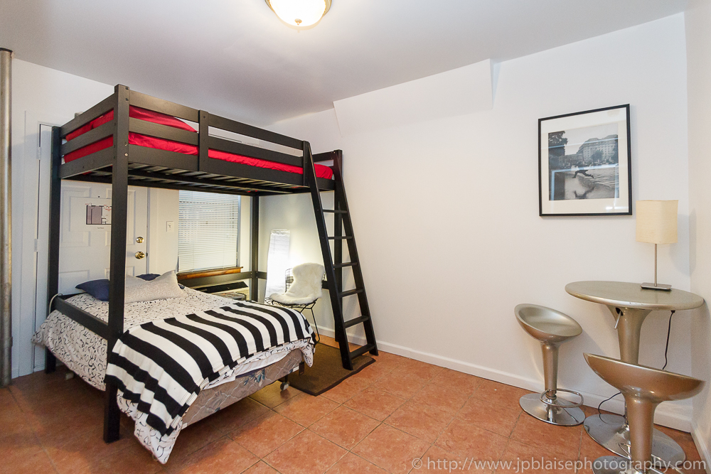 Real Estate photographersession: bedroom picture of one bedroom apartment in midtown west