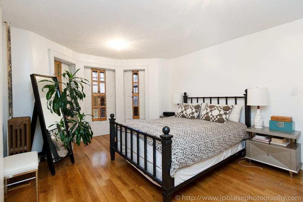 Interior Photography of bedroom with hardwood floor in Crown Heights, Brooklyn, New York City