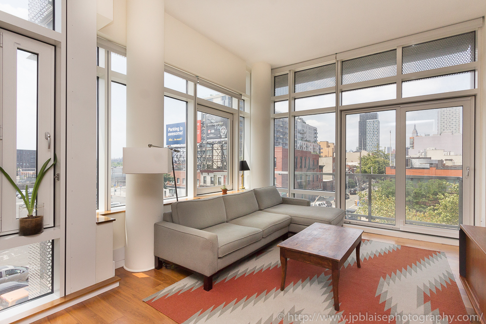 Professional photography of living room of Two-Bedroom – Two-Bathroom Luxury Condominium in Long Island City, Queens