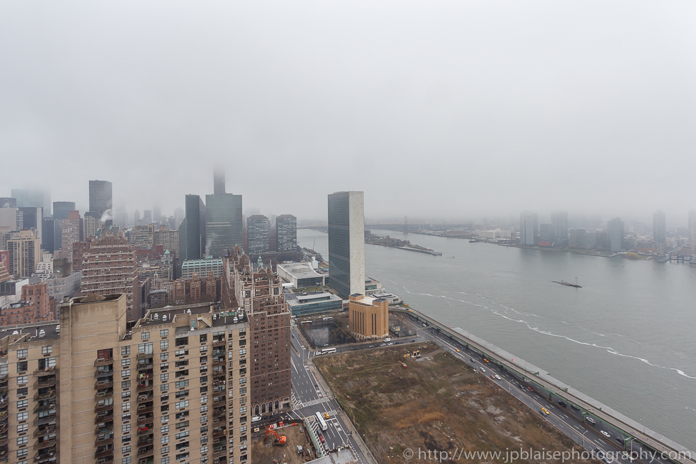 East river views on a foggy day from Midtown East Unit New York 